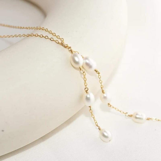 14K gold-filled Y necklace featuring a natural pearl pendant, perfect for boho-inspired style.